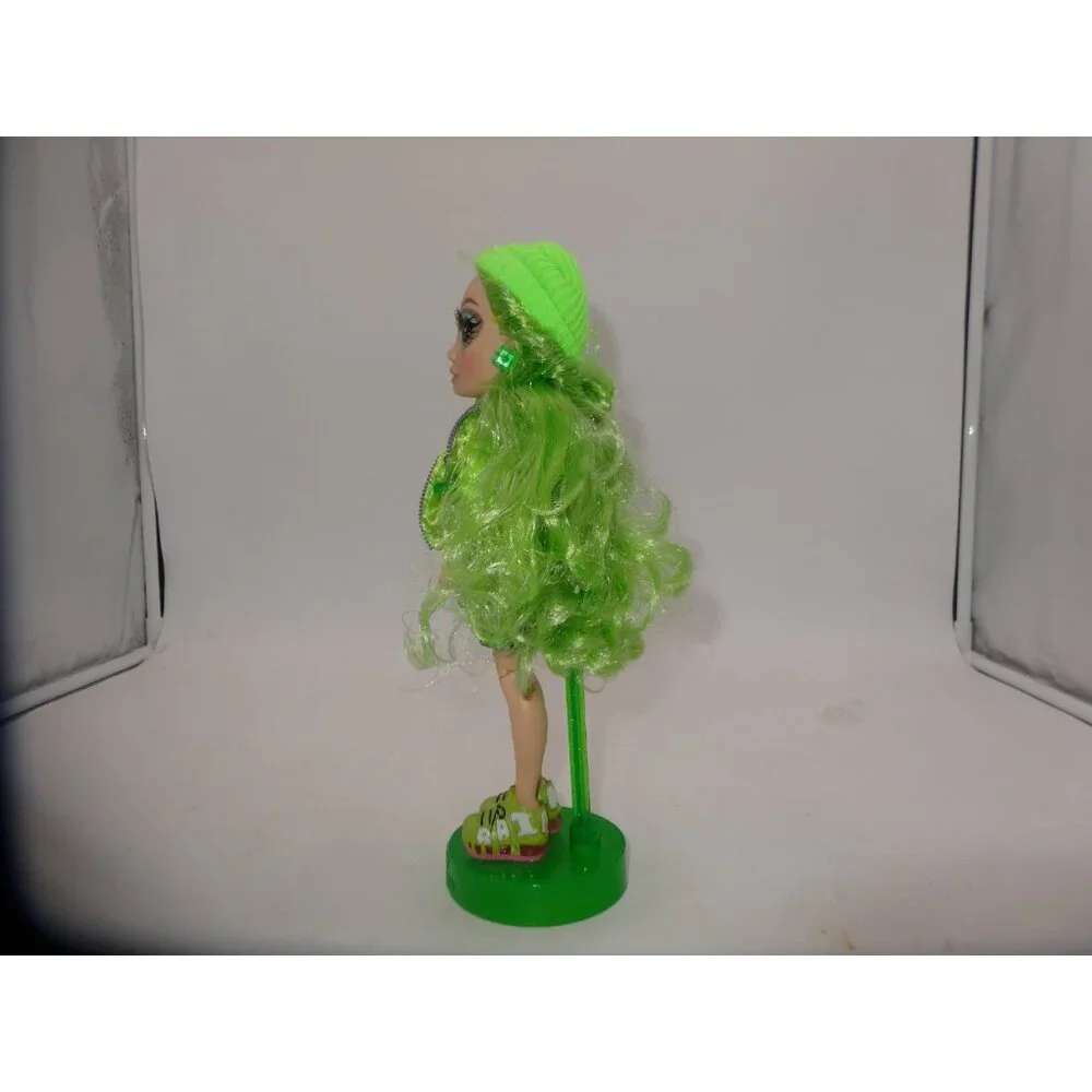 Rainbow High Jade Hunter Fashion Doll Dressed in Shorts Hat Jacket Top and Stand